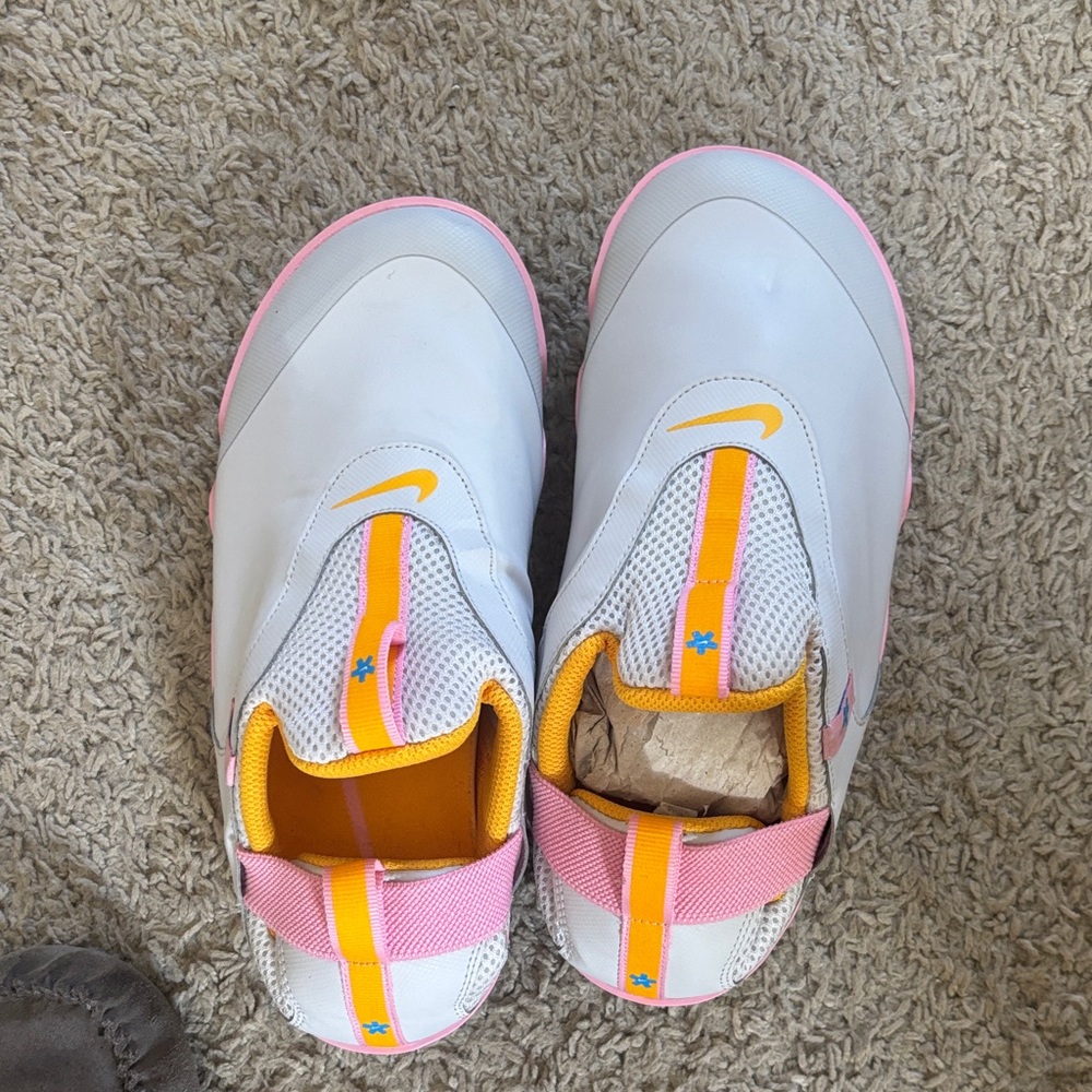 Nike White Slip-On Sneakers with Pink and Yellow Accents
